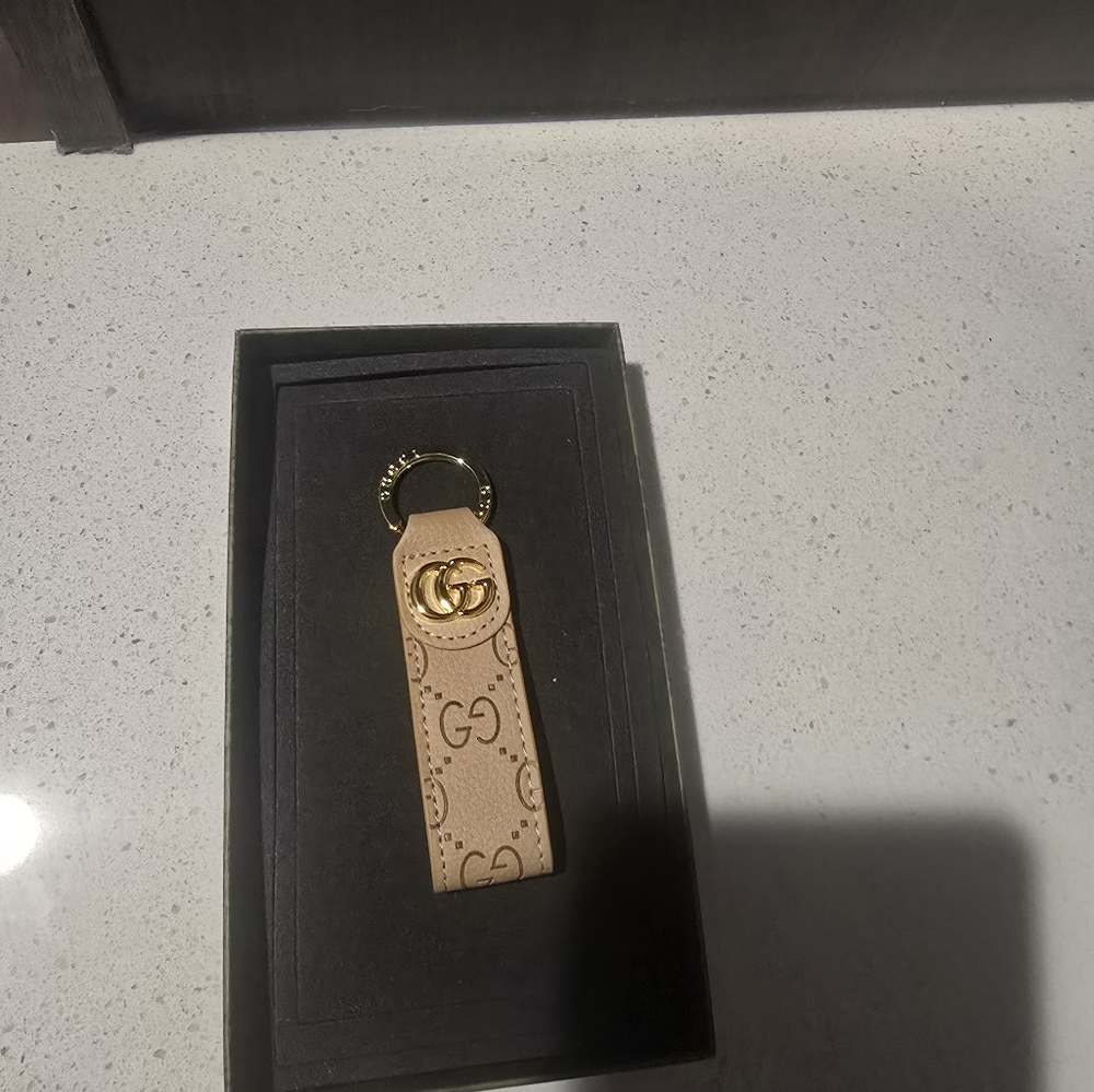 Gucci Tan Key Holder with Gold Details